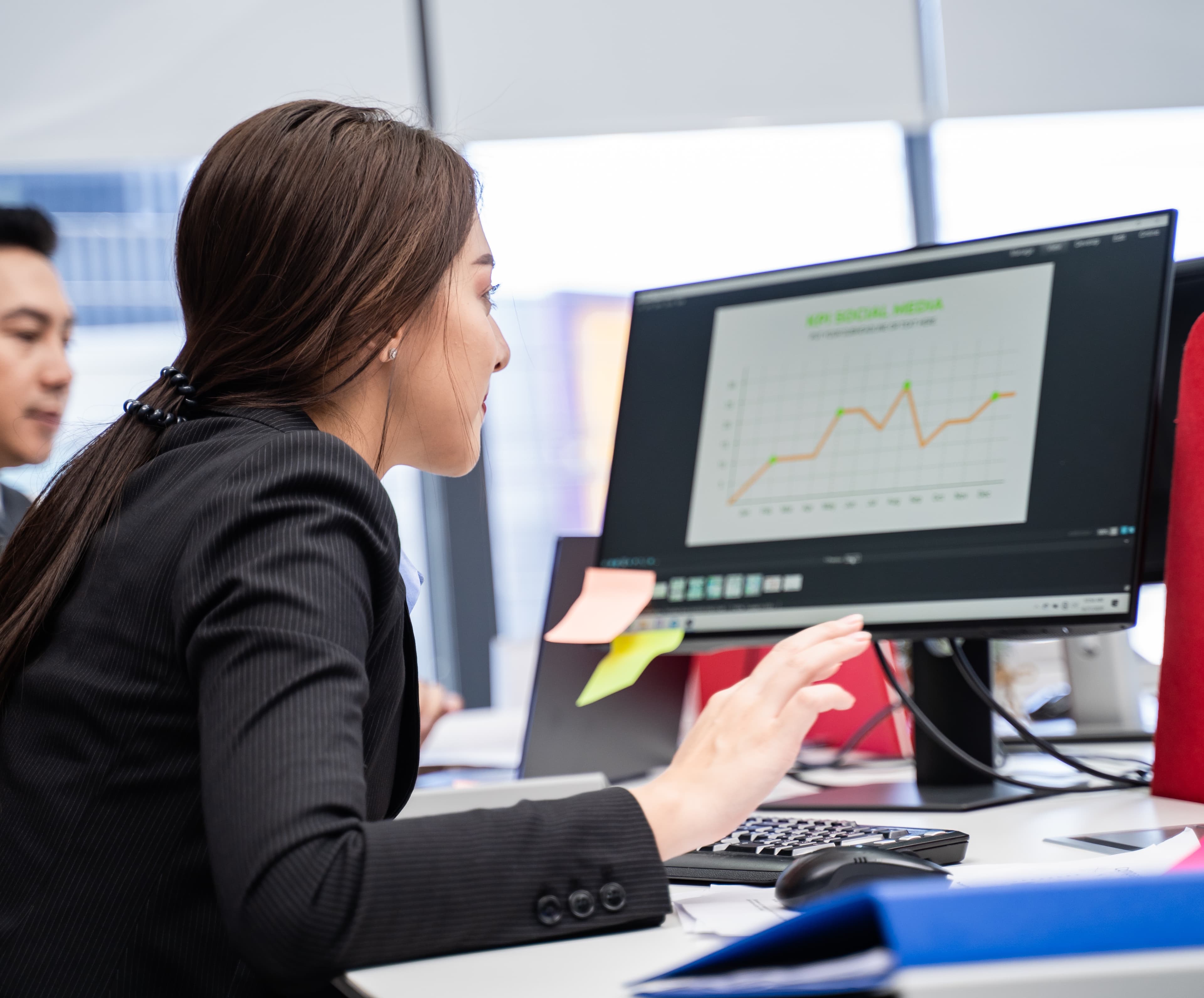 Business team reviewing data backup and recovery on a laptop